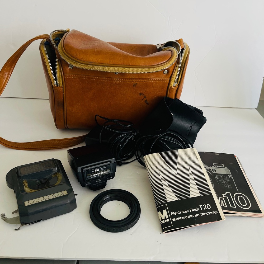 VTG Olympus OM10 35mm SLR Camera 50mm f1.8 Lens T20 Flash Case Polaroid 440